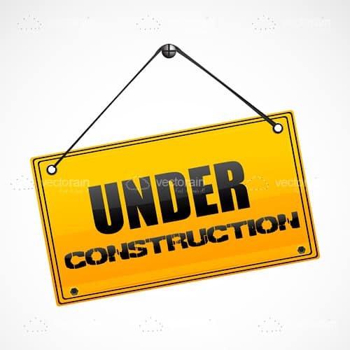 Under Construction Sign Hanging from a Nail